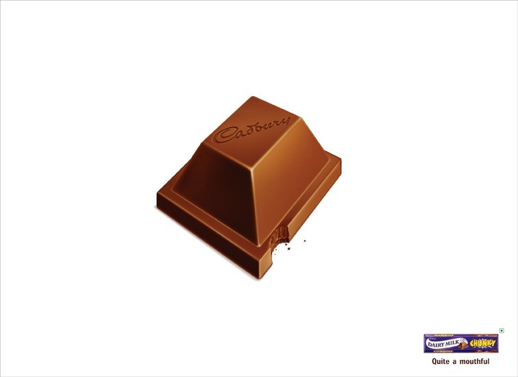 Cadbury Dairy Milk Chunky print ad — 'Quite a mouthful' — oversized single chunk of Cadbury Dairy Milk against white, minimal layout