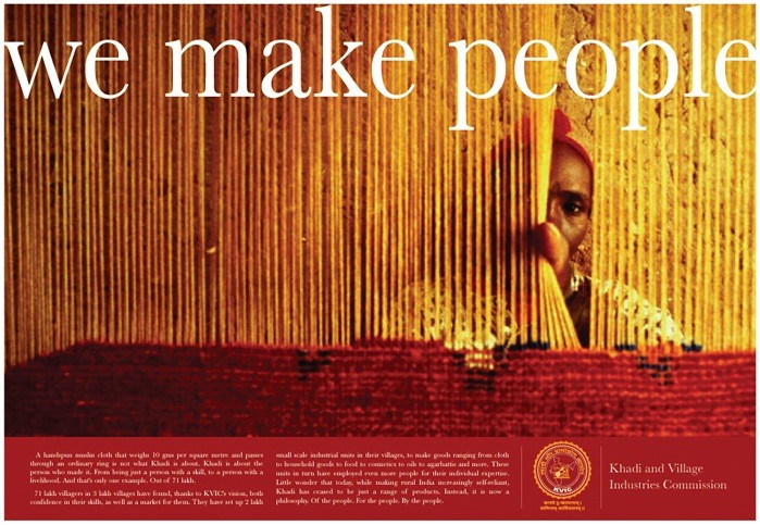 Khadi KVIC print ad — 'we make people' headline, woman weaving fabric through golden threads, long-copy body text, KVIC logo